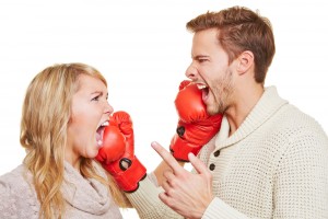 couple fighting with boxing gloves
