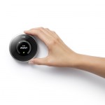 nest_thermostat_with_hand